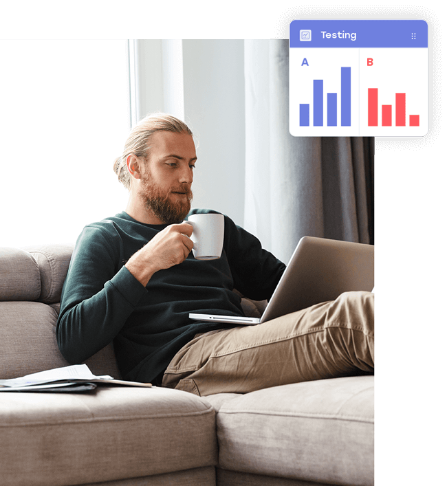 A man working on a laptop on a sofa, with a floating panel comparing two sets of test results